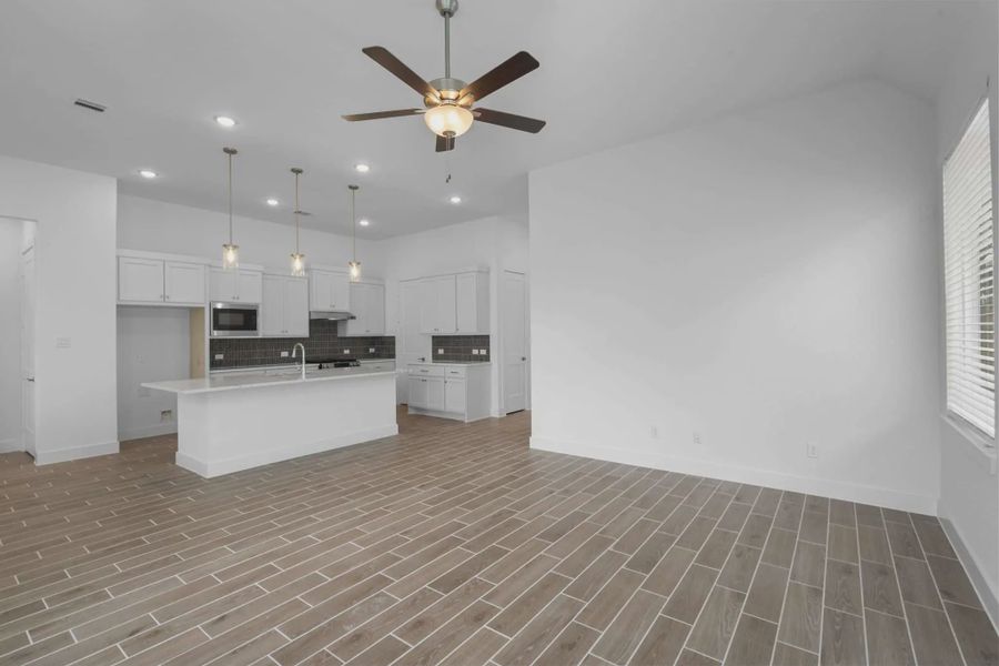 Representative unfurnished interior of a home built from the Mickelson by Chesmar Homes in Riceland Alley Loads, Mont Belvieu (Image 78).