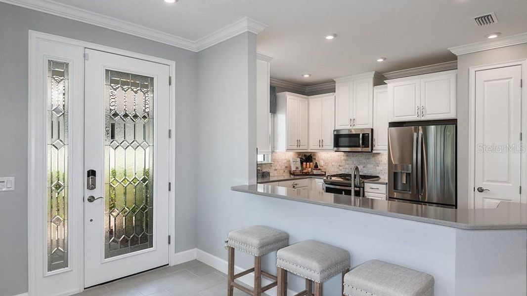 Furnished interior view inside a new home in Esplanade at Azario Lakewood Ranch, Bradenton (Image 3).