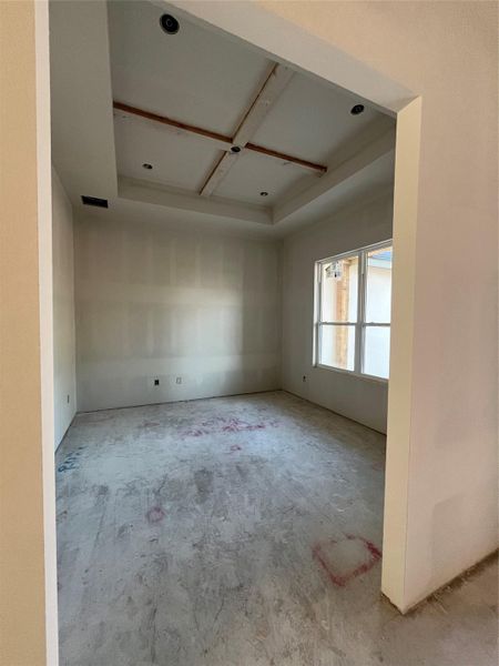 Study with pop up ceiling and beams.