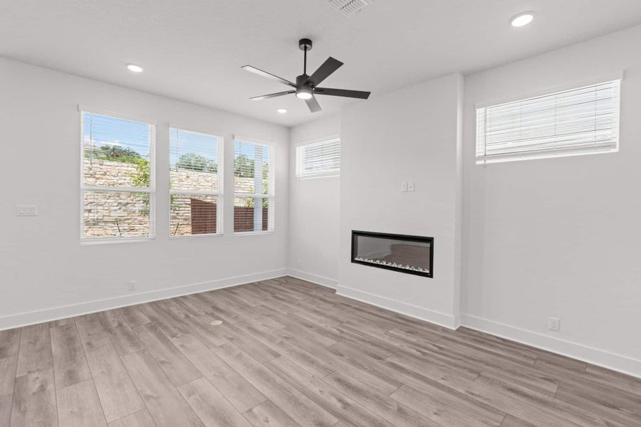 Representative unfurnished interior of a home built from the Balder by Chesmar Homes in Centero at Stone Oak, San Antonio (Image 8).