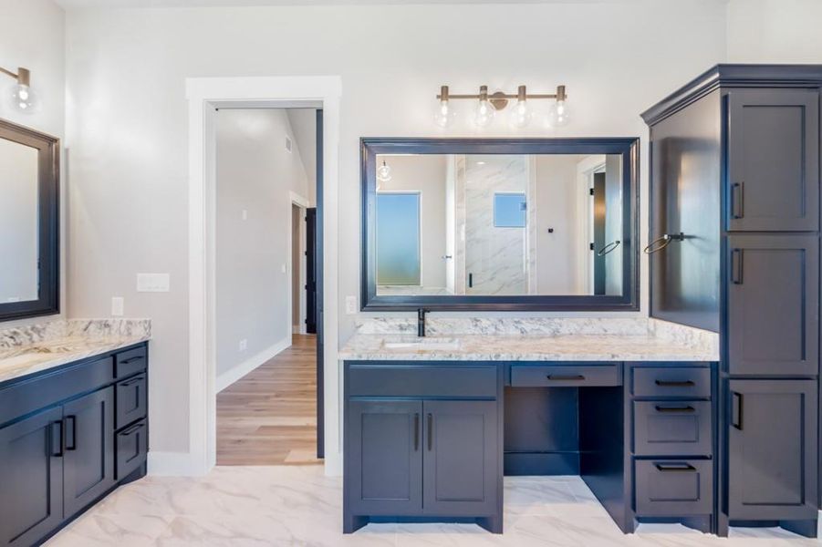 Bathroom with vanity and walk in shower