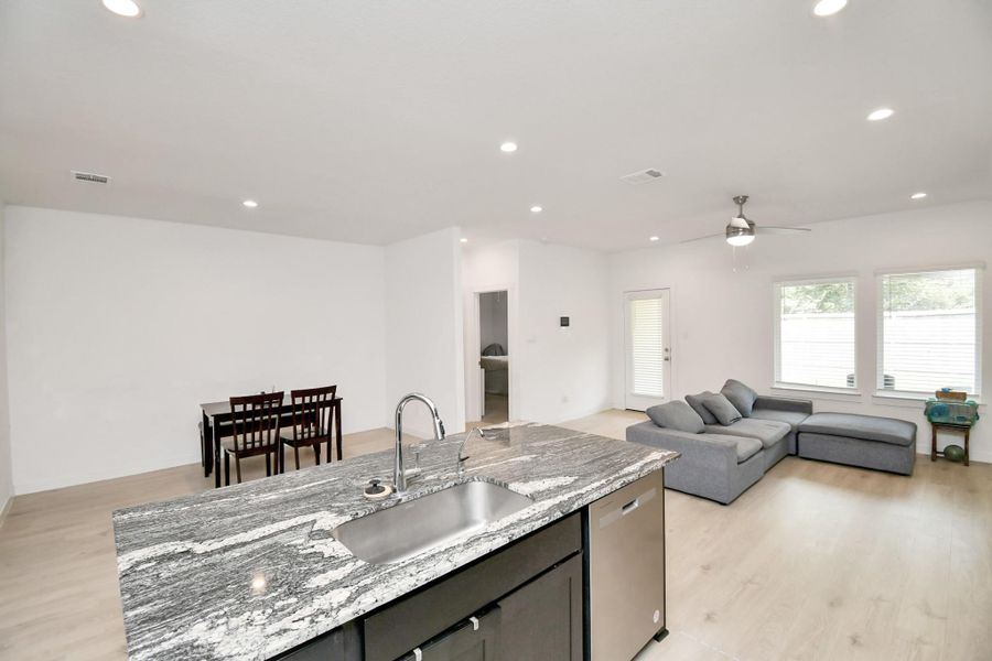Furnished interior view inside a new home in Post Oak Pointe, Fresno (Image 9).