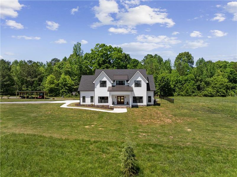 Front exterior of a new home in , Resaca, GA, highlighting curb appeal (Image 23).