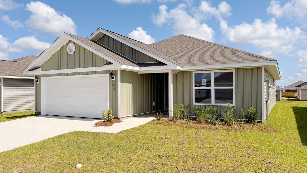 Front exterior of a new home in Liberty, Panama City, FL, highlighting curb appeal (Image 2). Front exterior of a new home in Liberty, Panama City, FL, highlighting curb appeal (Image 2).