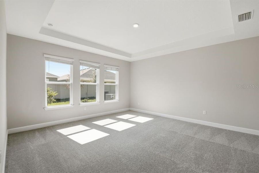 Spacious, unfurnished interior of a new home in Harvest at Ovation, Winter Garden (Image 27).