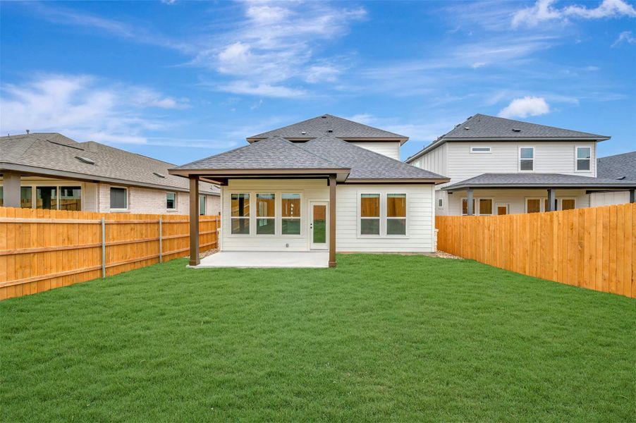 Exterior details and patio area of a home in Heritage, Dripping Springs (Image 15).