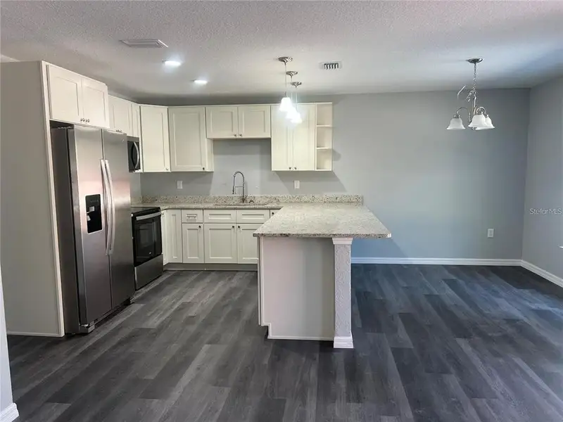 Furnished interior view inside a new home in , Ocala (Image 3).