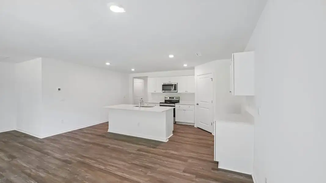 Furnished interior view inside a new home in Mangum Farms, Stem (Image 6).