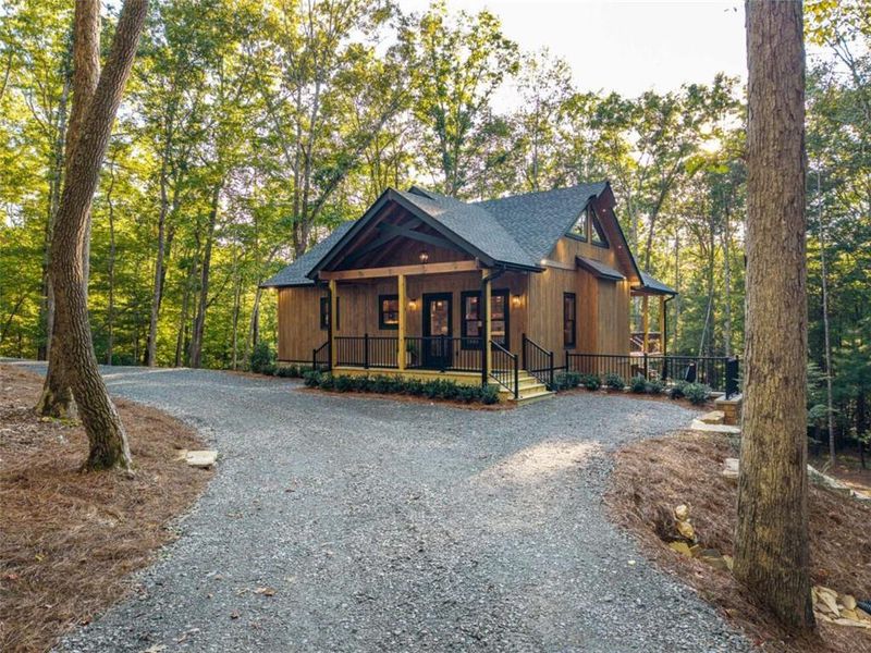 Front exterior of a new home in , Morganton, GA, highlighting curb appeal (Image 1). Front exterior of a new home in , Morganton, GA, highlighting curb appeal (Image 1).