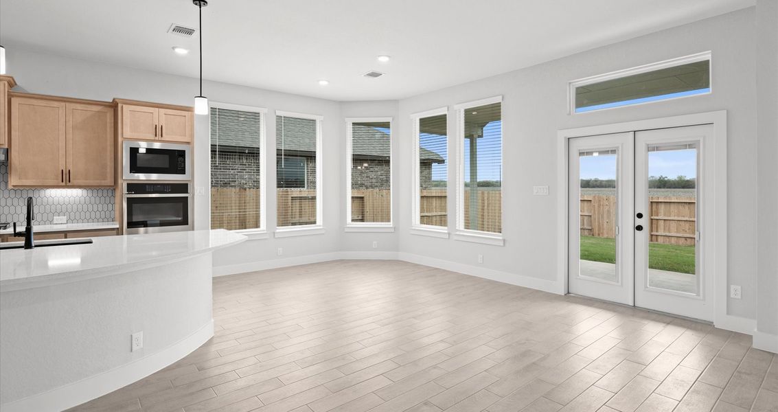 Representative furnished interior of a home built from the Gibson by Chesmar Homes in Highland Village, Georgetown (Image 5).