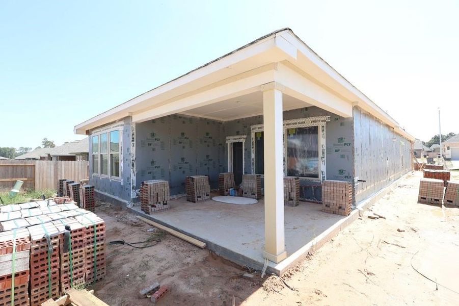 Front exterior of a new home in Escondido 45’ Homesites, Magnolia, TX, highlighting curb appeal (Image 1).