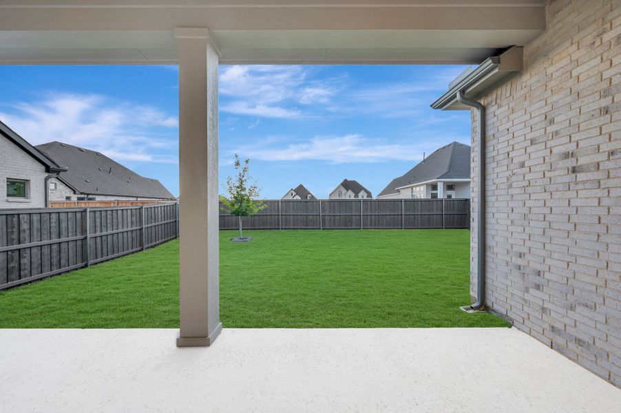 Exterior details and patio area of a home in Goodland – Classic Series, Grand Prairie (Image 4).