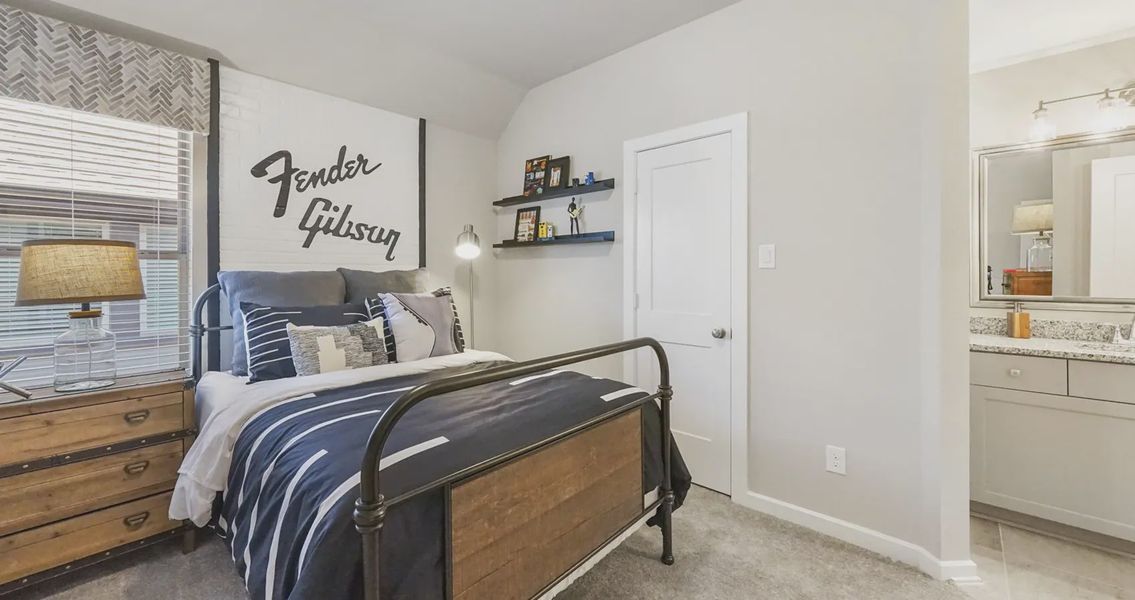 Representative furnished interior of a home built from the Medina by Chesmar Homes in Jordan Ranch 55's, Fulshear (Image 12).