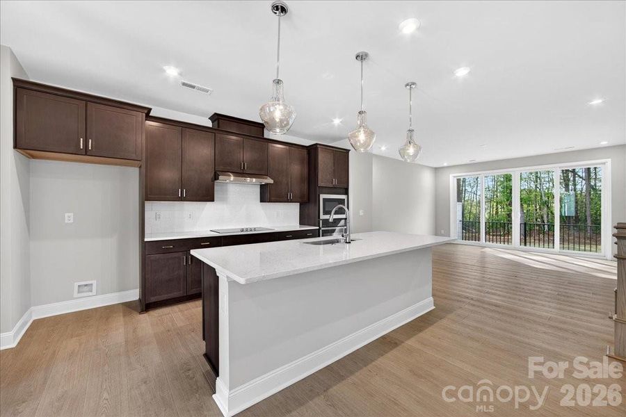 Open concept living with ample natural light