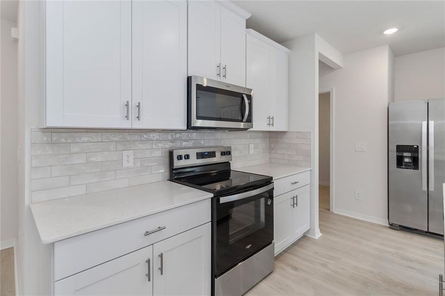 Furnished interior view inside a new home in , St. Cloud (Image 5).