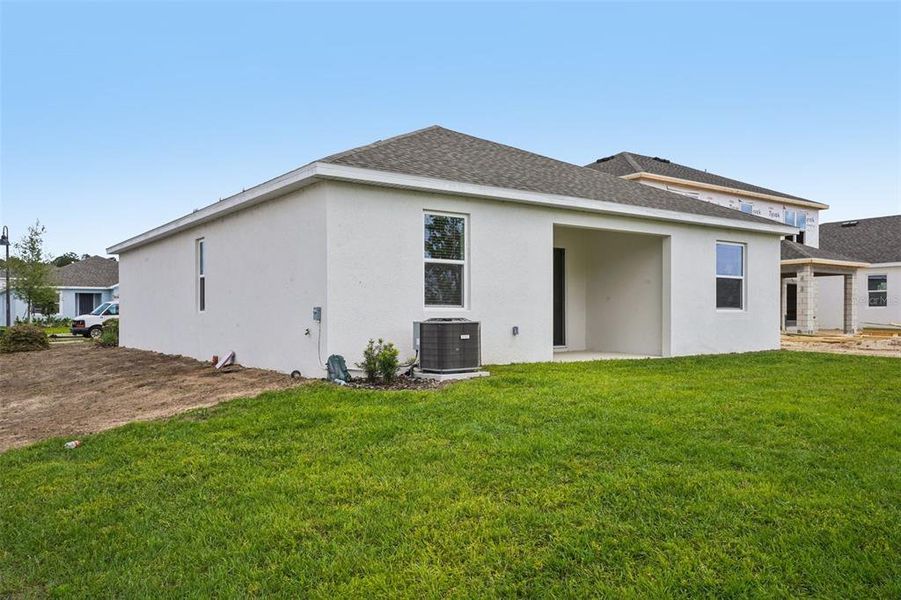 Exterior details and patio area of a home in Trinity Gardens, Deland (Image 3).