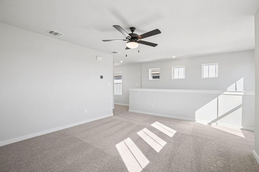 Spacious, unfurnished interior of a new home in Avery Centre, Round Rock (Image 25).