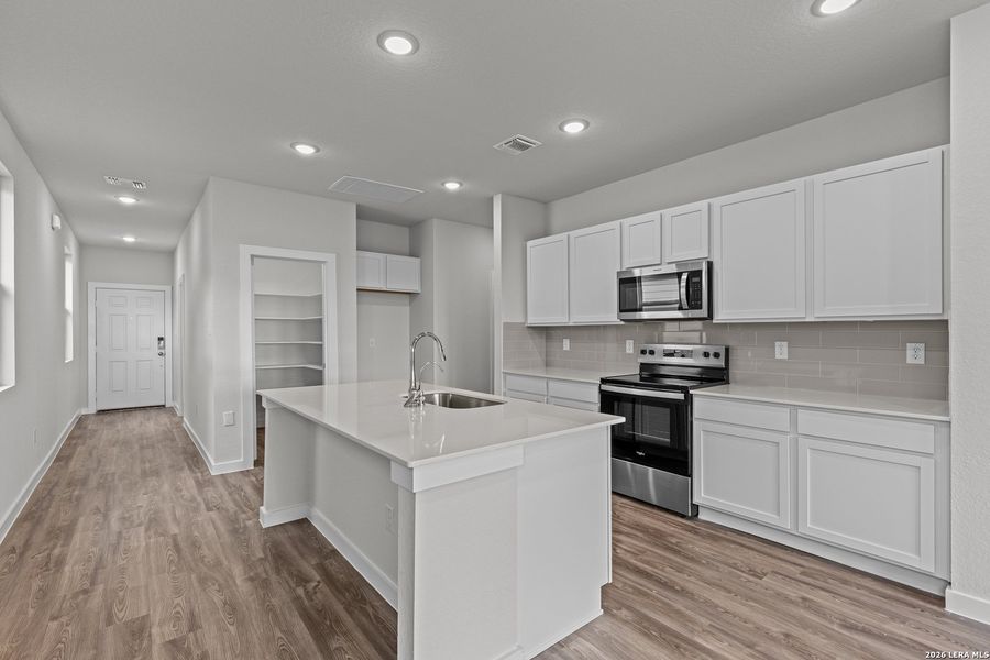 Furnished interior view inside a new home in Mesa Vista, San Antonio (Image 3).