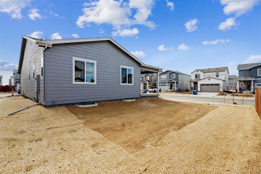 Exterior details and patio area of a home in Farmlore, Brighton (Image 4).