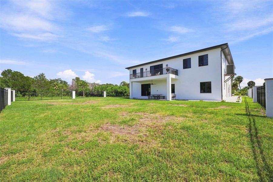 Exterior details and patio area of a home in , Port Richey (Image 36).