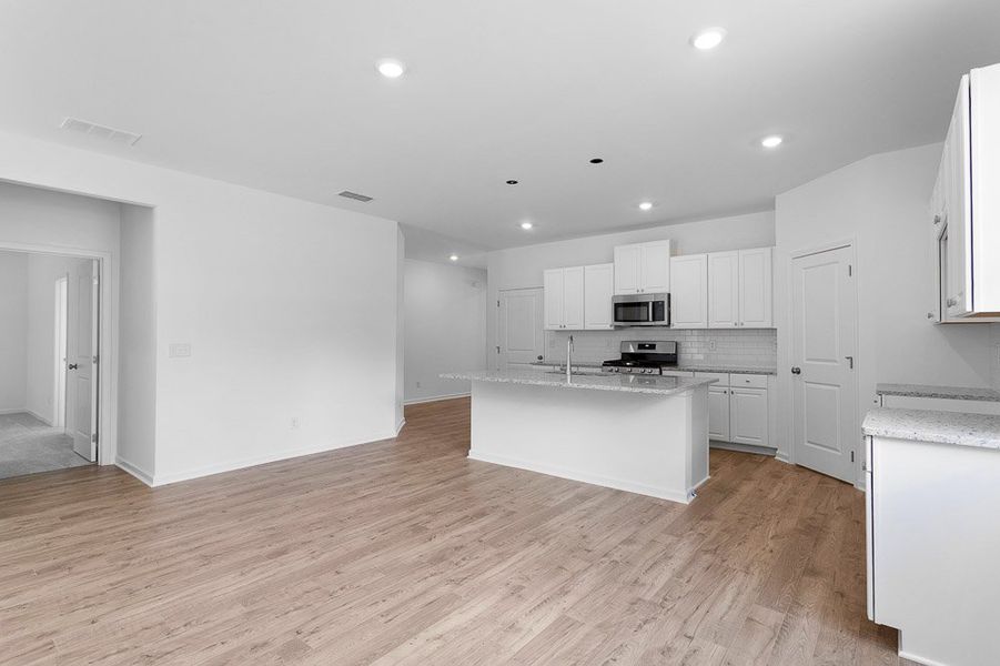 Representative unfurnished interior of a home built from the Moreland by Taylor Morrison in Heritage River, Euharlee (Image 11).