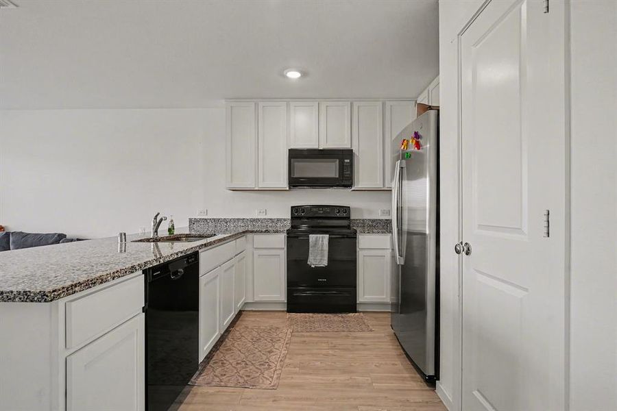 Furnished interior view inside a new home in Tillage Farms, Princeton (Image 14).