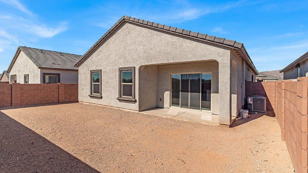 Representative exterior photo of a completed home built from the Harris by D.R. Horton in The Oasis at Rocking K, Vail, AZ (Image 23).
