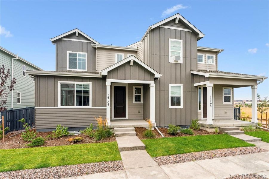 Front exterior of a new home in Paired Homes at Alder Creek, Parker, CO, highlighting curb appeal (Image 1). Front exterior of a new home in Paired Homes at Alder Creek, Parker, CO, highlighting curb appeal (Image 1).