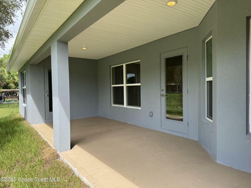 Exterior details and patio area of a home in Sebastian Highlands, Sebastian (Image 16).