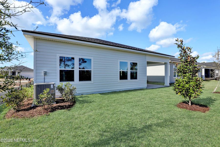 Exterior details and patio area of a home in New 55+ Active Adult Community in Palm Coast, Florida, Palm Coast (Image 4).