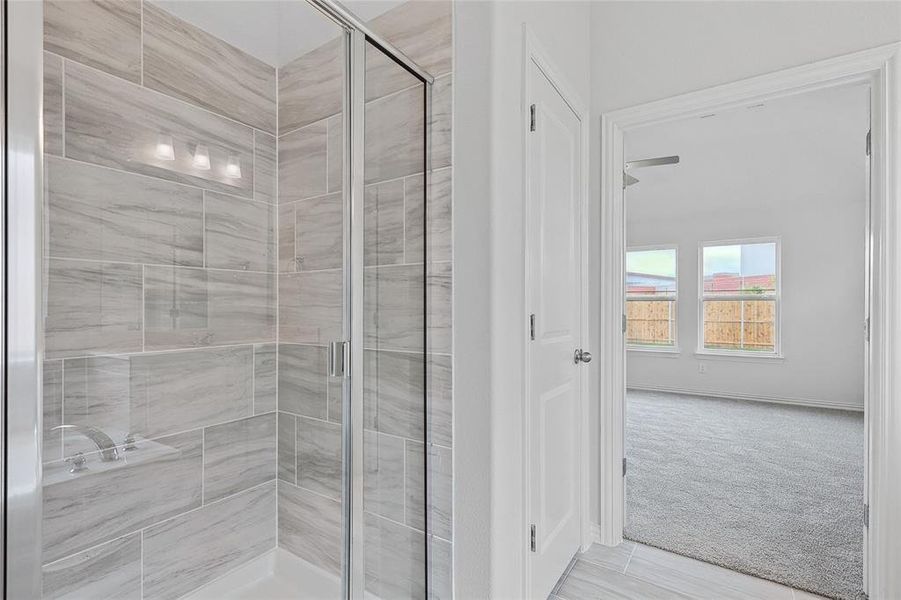 Bathroom featuring walk in shower