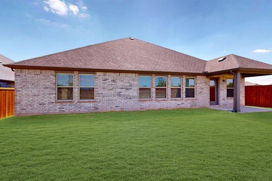 Exterior details and patio area of a home in The Preserve, Justin (Image 23). Exterior details and patio area of a home in The Preserve, Justin (Image 23).