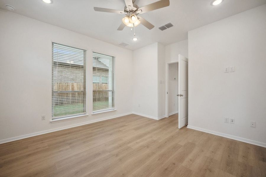 Spacious, unfurnished interior of a new home in The Hills of Bear Creek, Manchaca (Image 29).