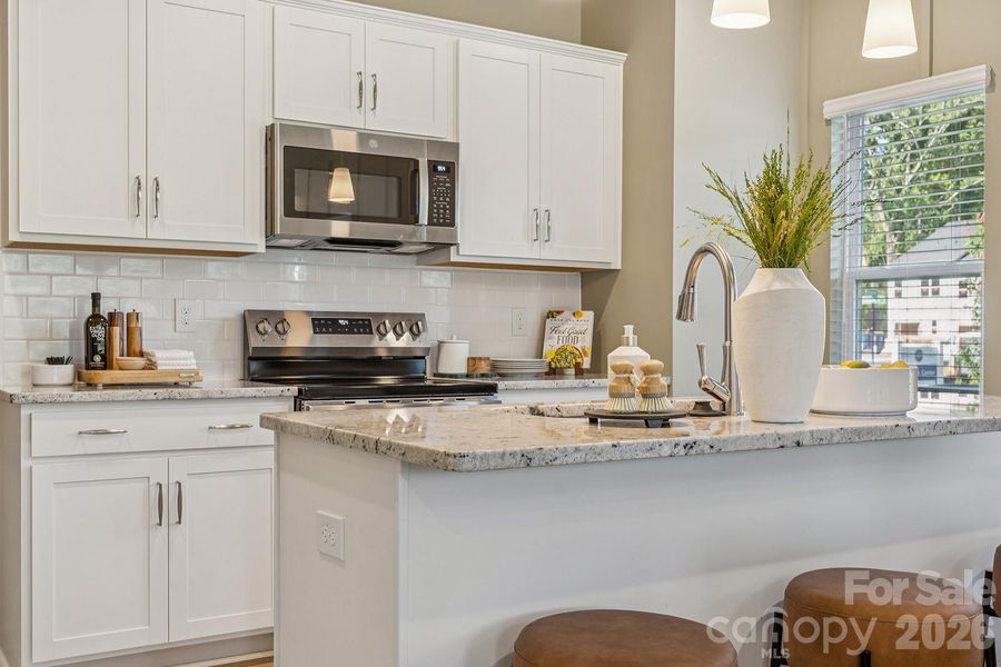 Example rendering Only - Home under construction with estimated completion in April or May.