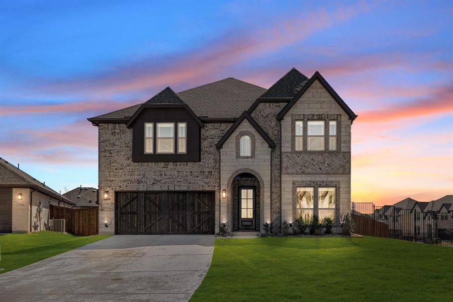 Front exterior of a new home in Willow Wood, McKinney, TX, highlighting curb appeal (Image 2).