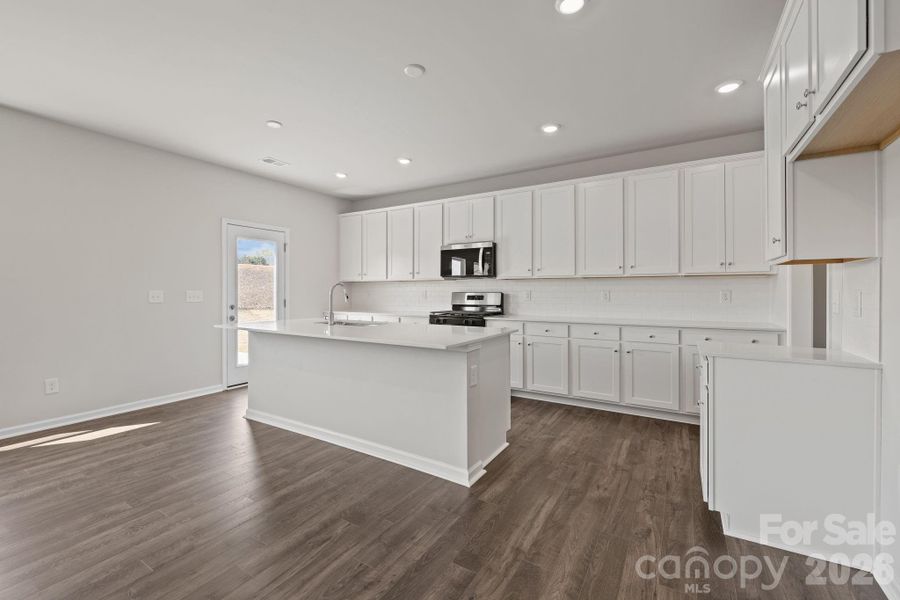 Furnished interior view inside a new home in McFarland Estates, York (Image 7).