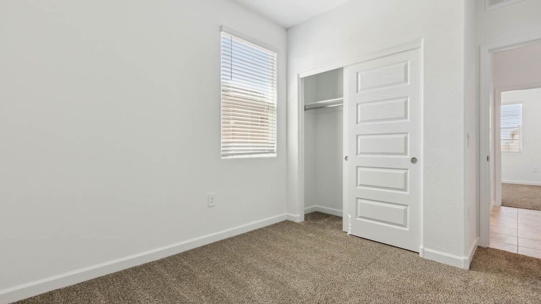 Spacious, unfurnished interior of a new home in Heartland Ranch, Coolidge (Image 23).