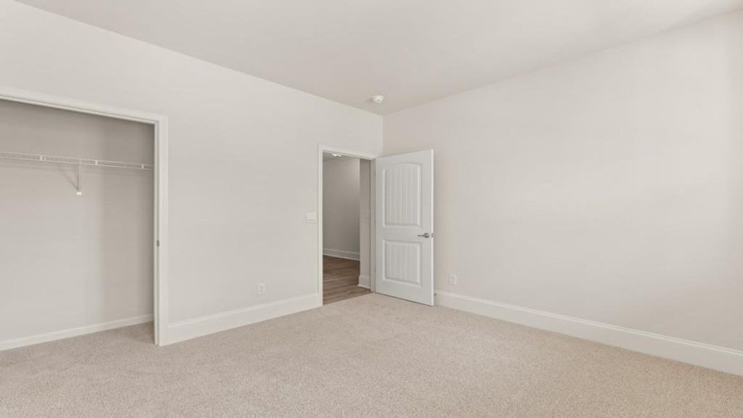 Spacious, unfurnished interior of a new home in Hamptons at Riverwood North, Dallas (Image 24).