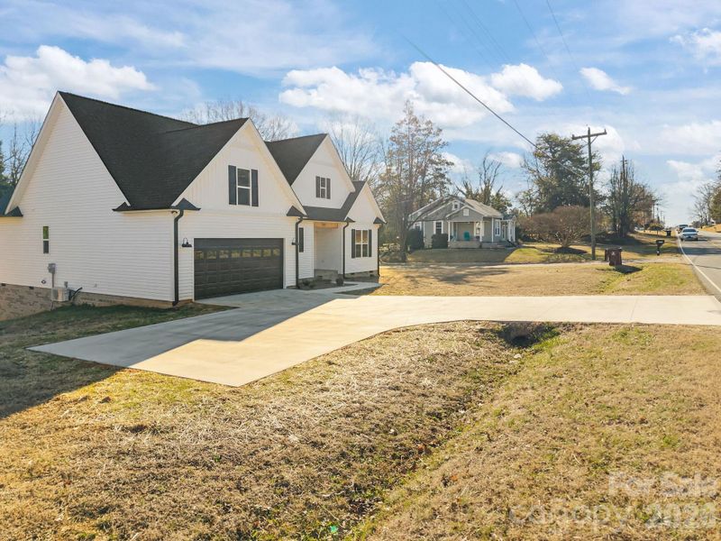 Front exterior of a new home in , Salisbury, NC, highlighting curb appeal (Image 15).