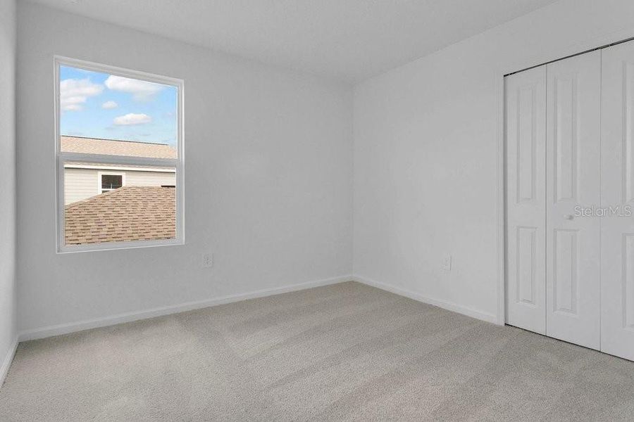 Spacious, unfurnished interior of a new home in Peace Creek Reserve, Winter Haven (Image 12).