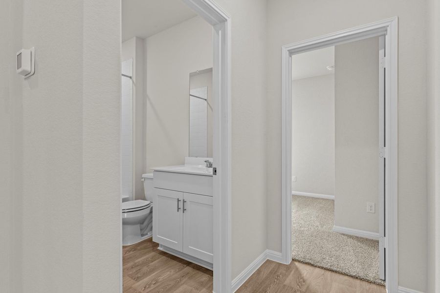Furnished interior view inside a new home in Whisper South, San Marcos (Image 13).