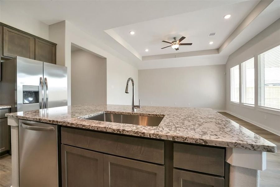 Furnished interior view inside a new home in Sunterra, Katy (Image 32).