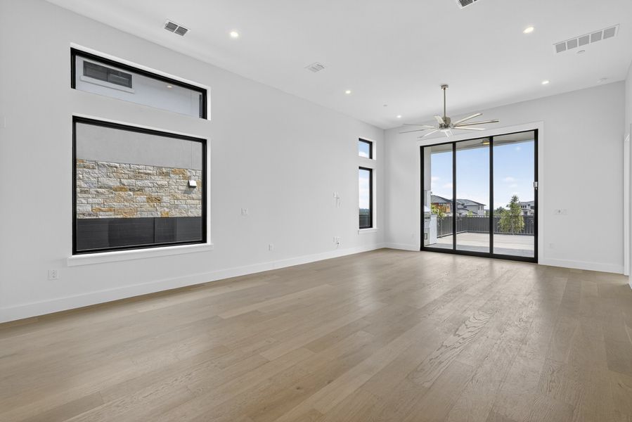 Spacious, unfurnished interior of a new home in Milky Way at River Place, Austin (Image 23).