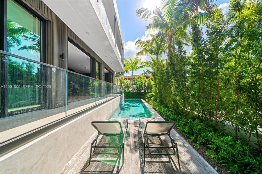Exterior details and patio area of a home in , Miami Beach (Image 32).