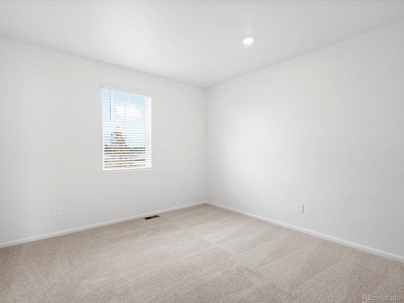 Spacious, unfurnished interior of a new home in Poudre Heights: The Lakes Collection, Windsor (Image 21).