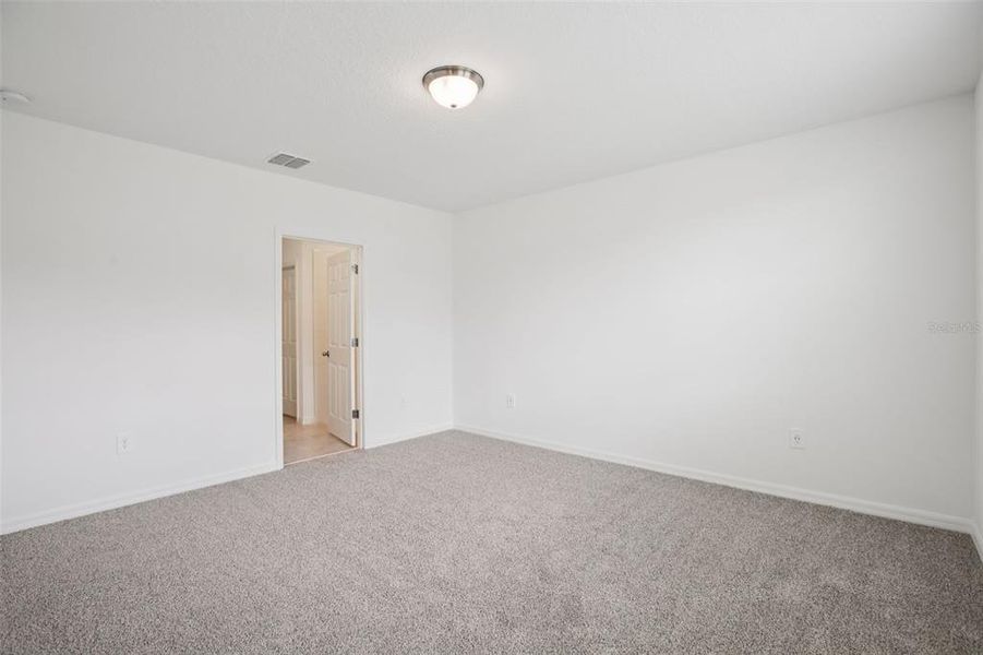 Spacious, unfurnished interior of a new home in Villamar - Classic Series, Winter Haven (Image 17).