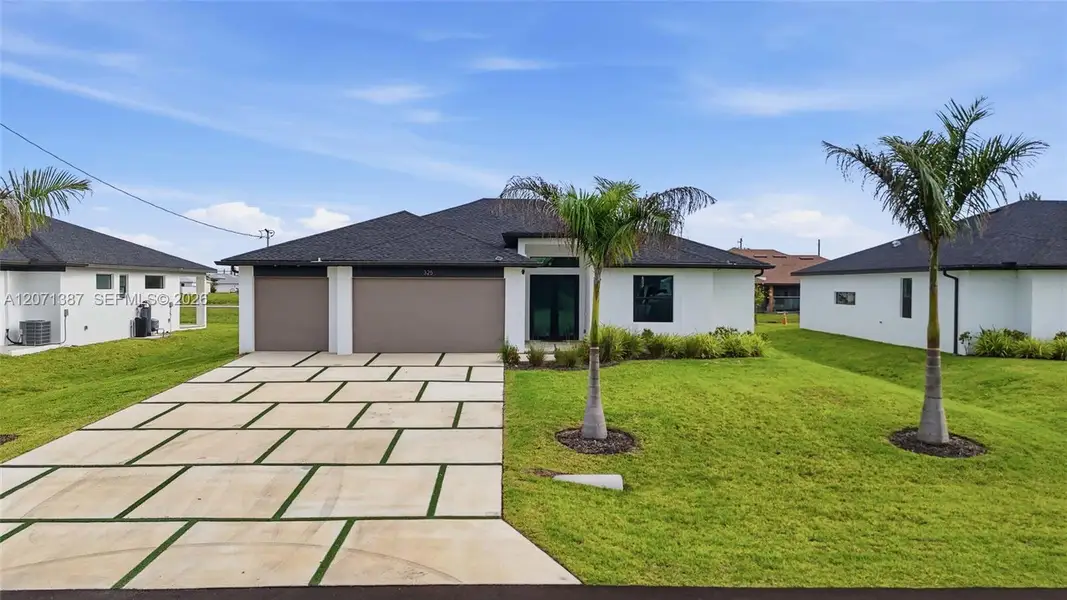 Front exterior of a new home in , Cape Coral, FL, highlighting curb appeal (Image 25).