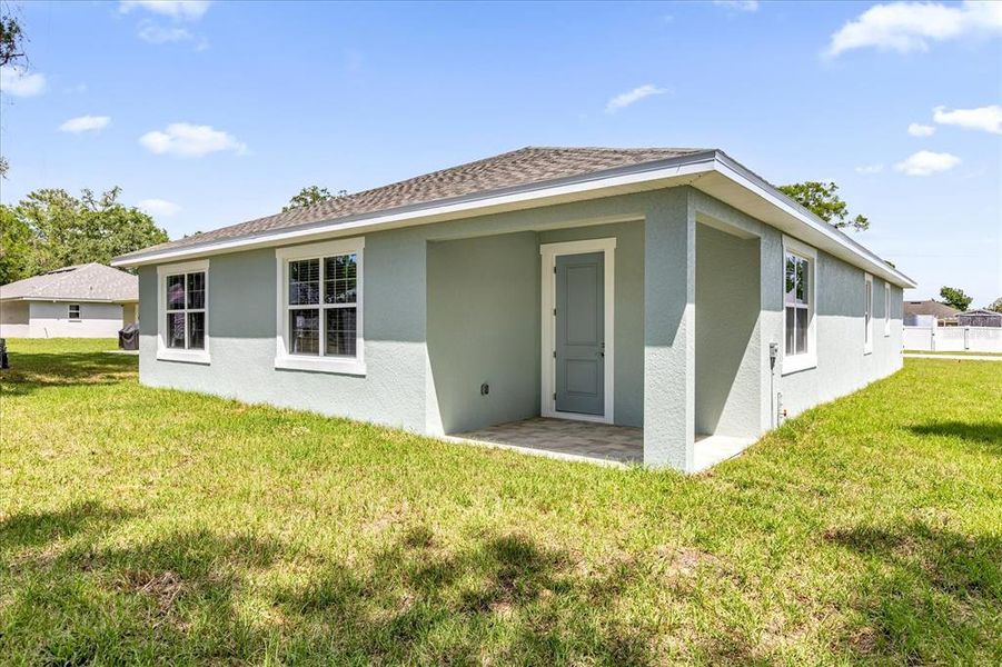 Exterior details and patio area of a home in , Summerfield (Image 3).