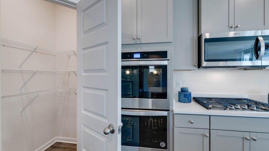 Representative furnished interior of a home built from the Fleetwood by D.R. Horton in Evergreen Crossing, Locust Grove (Image 17).