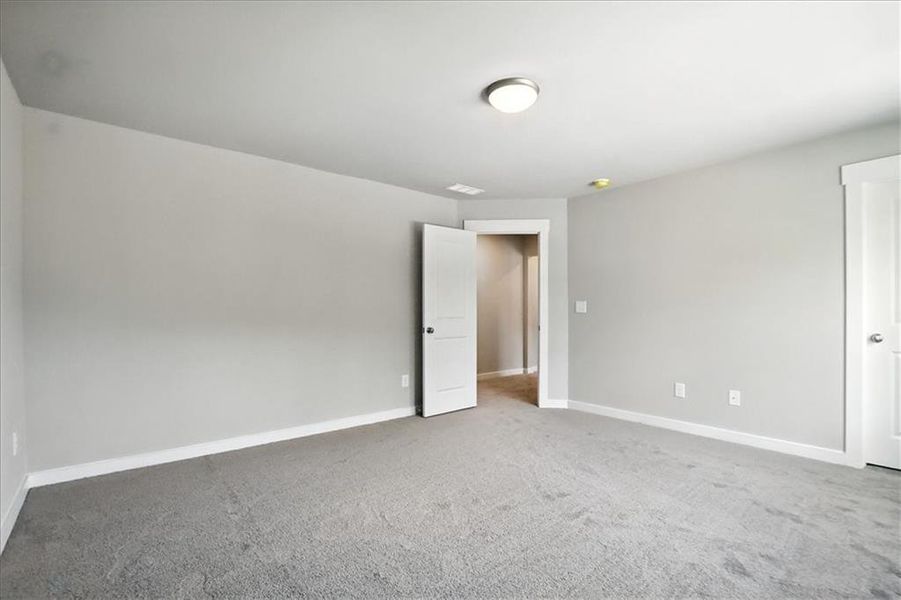 Spacious, unfurnished interior of a new home in Traditions of Braselton, Jefferson (Image 48).